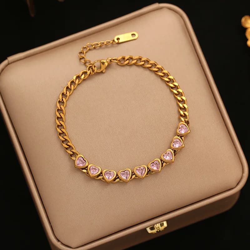 Goldene Gliederarmkette mit Perlen