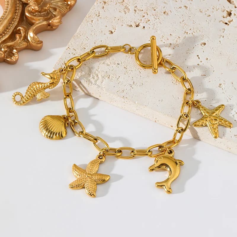 Edelstahl-Armband mit Seestern-, Muschel- und Seepferdchen-Charm