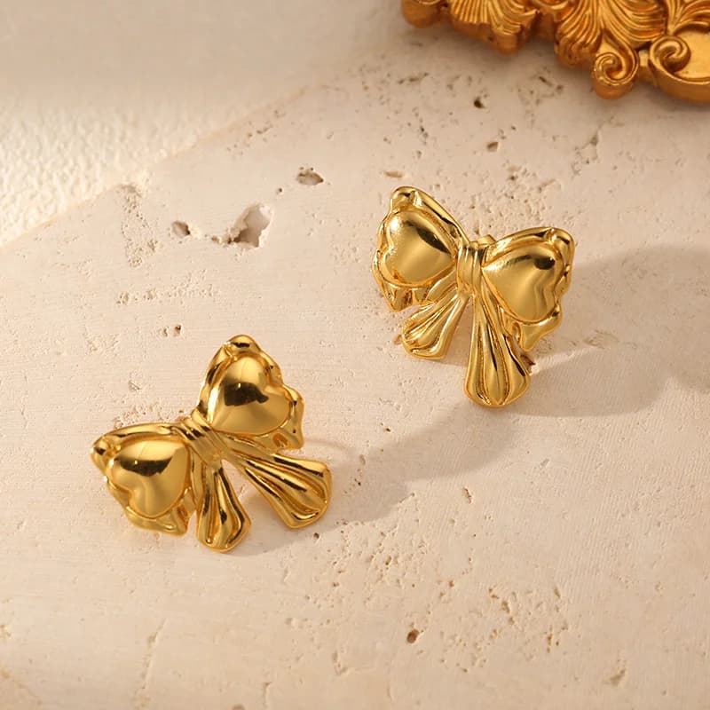 Edelstahl Stecker Ohrringe mit Goldfarbenem Schleifenmotiv