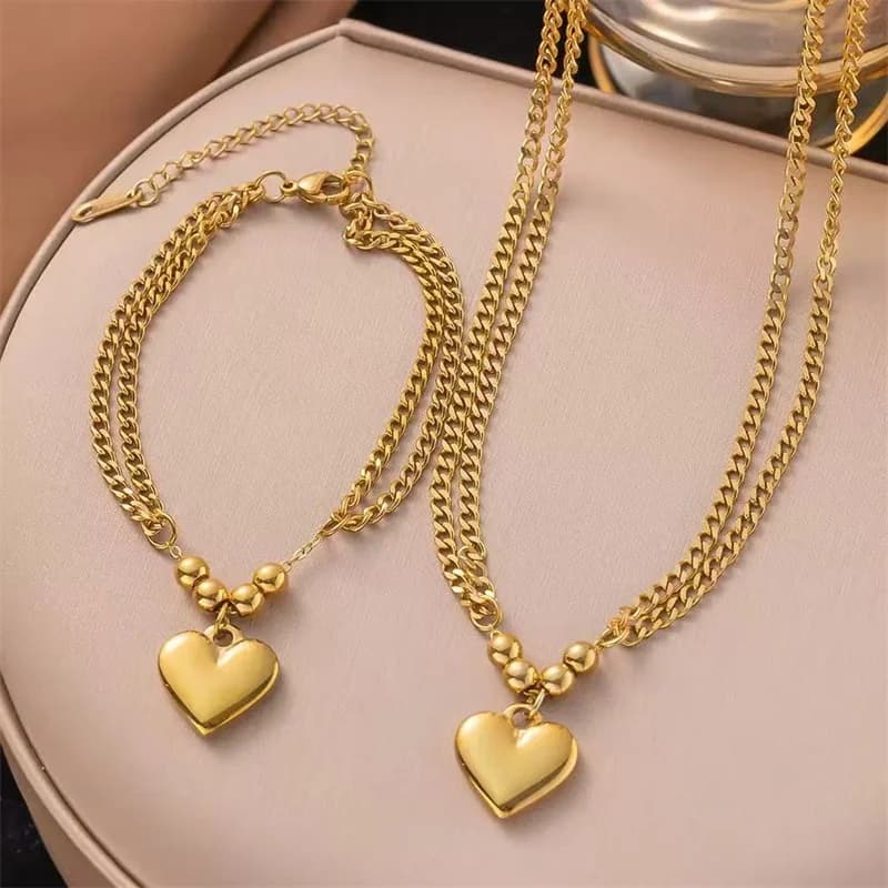Goldenes Herz-Charm-Halsketten- und Armband-Set