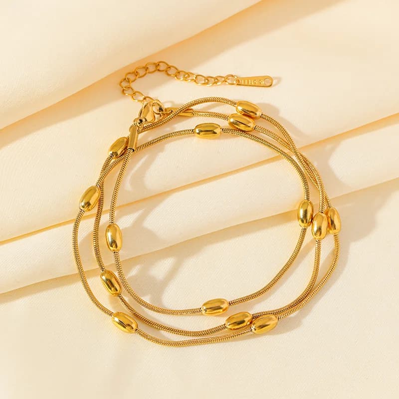 Goldenes mehrschichtiges Ketten-Set mit Armband