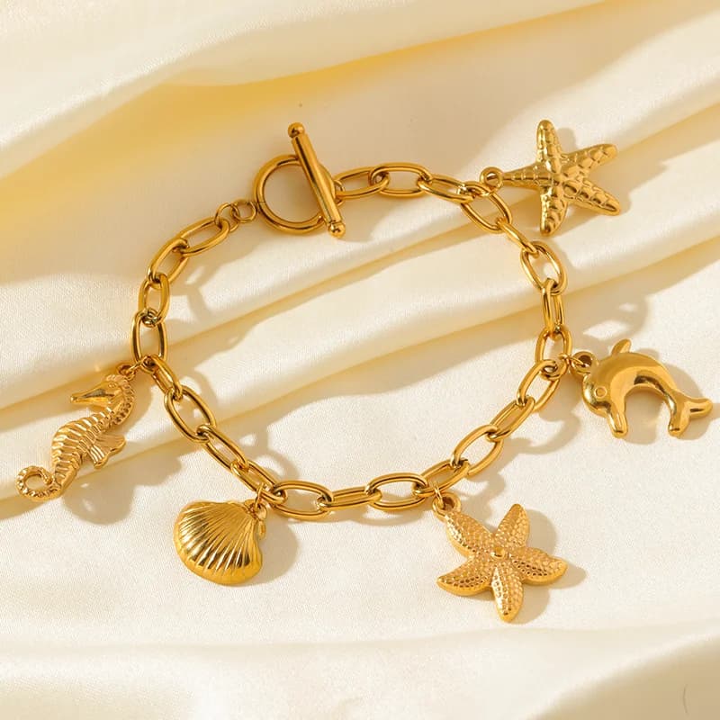 Goldene Sonne-Mond-Seestern Charm-Armband