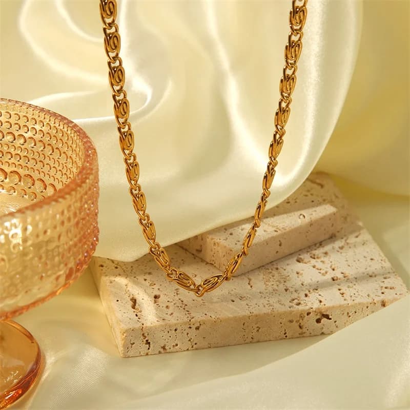Geometrisches Halsketten- und Armbandset, Gold