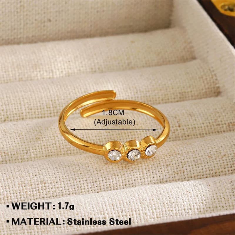 Goldfarbener Zirkonia-Augen-Charm-Aussagering